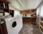 Laundry facilities at the cabin allow for extended fishing and hunting trips